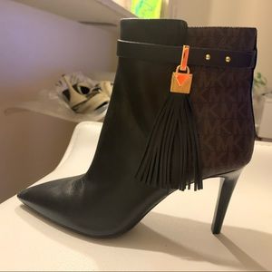 Michael Kors booties. New, never used.